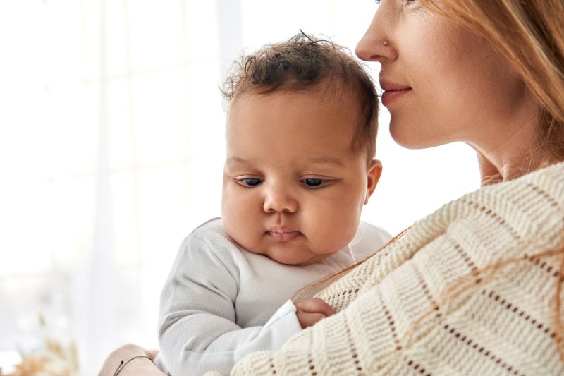 adoption image, caucasian mom and african american baby 800